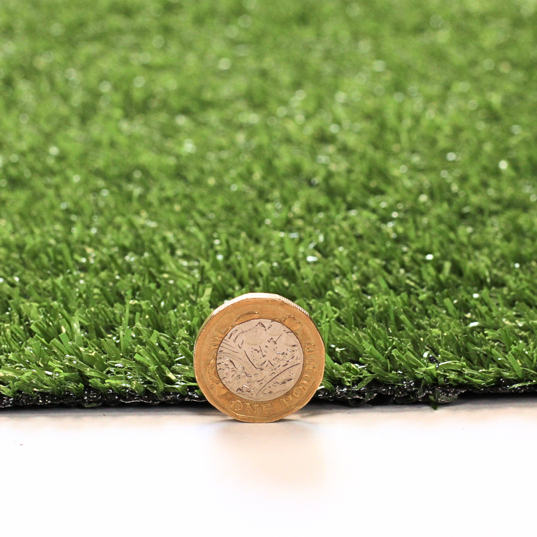 1 Coin placed by our alton artificial grass to demonstrate texture and size - Grass Cash and Carry