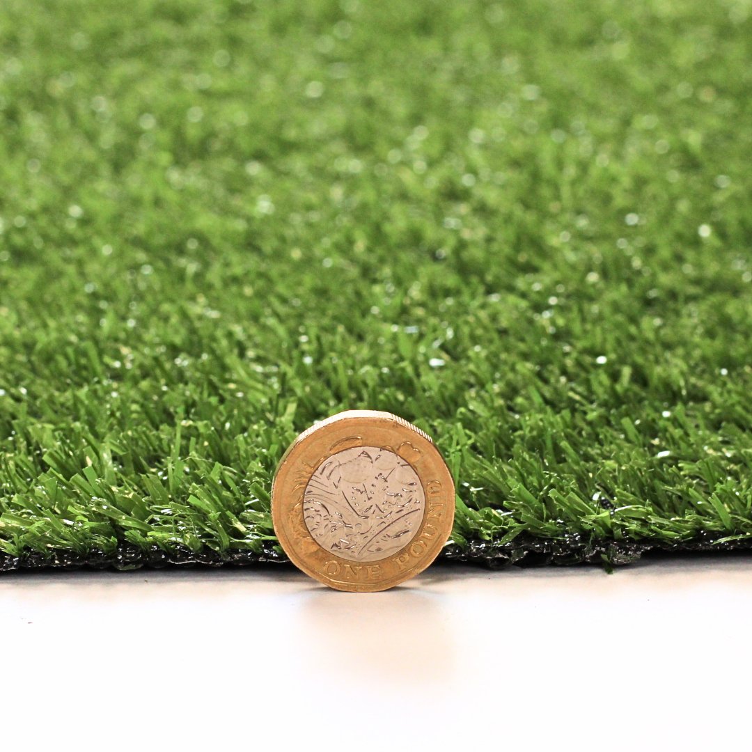Alton 7mm Budget Artificial Grass pile height vs 1 coin - Grass Cash and Carry
