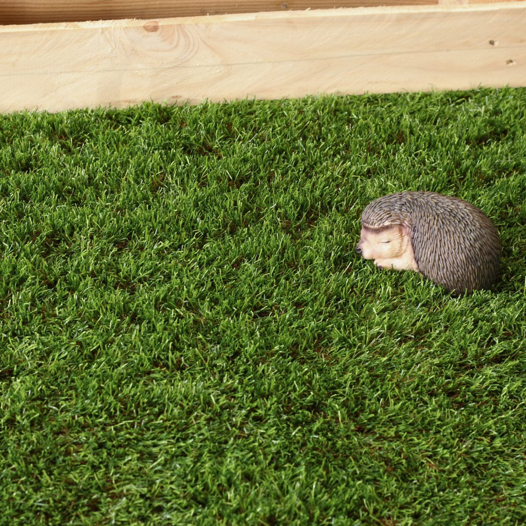 Camden 30mm Budget Artificial Grass with hedgehog ornament (close up)