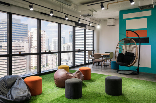 a coworking office space with indoor artificial turf