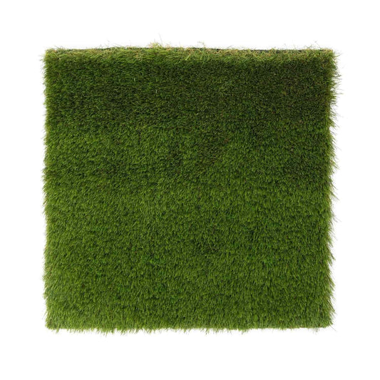 Square piece of artificial grass on a white background